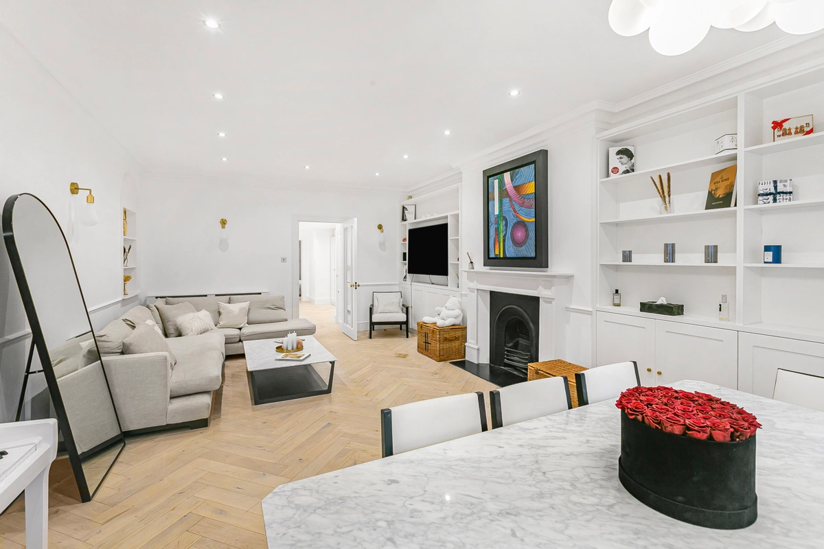Panoramic view showing living room, dining area, and open-plan layout