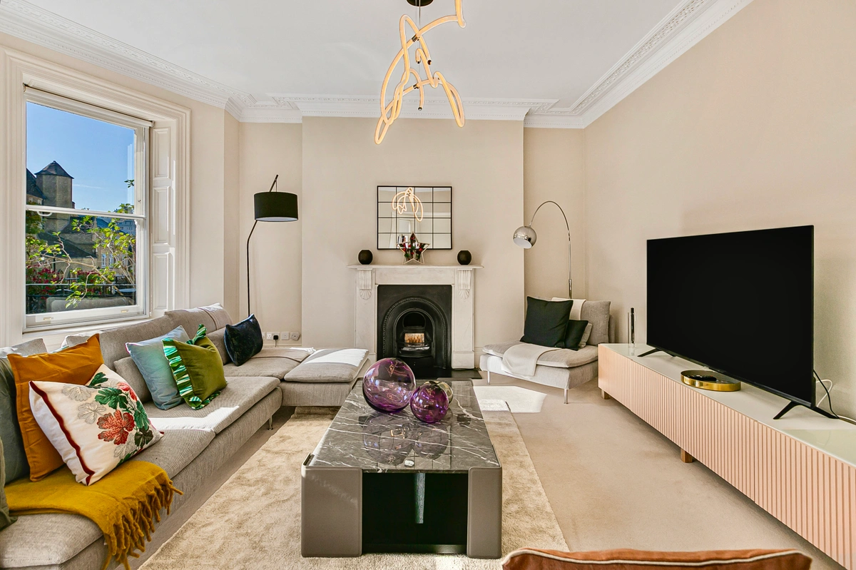 Spacious living area with tasteful decor and natural light