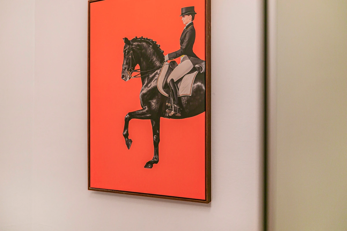 Colorful artwork displayed on a feature wall in the living space