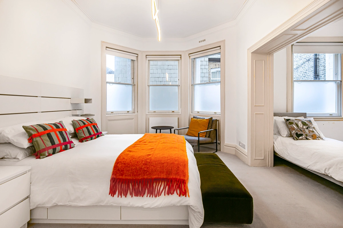 Refined bedroom with king-size bed and designer decor