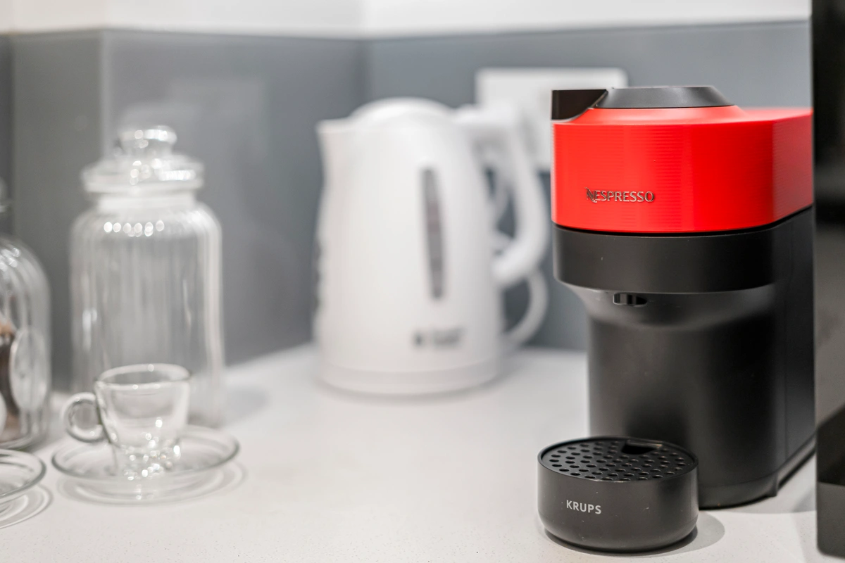 Coffee machine on a minimalist countertop ready for morning brews