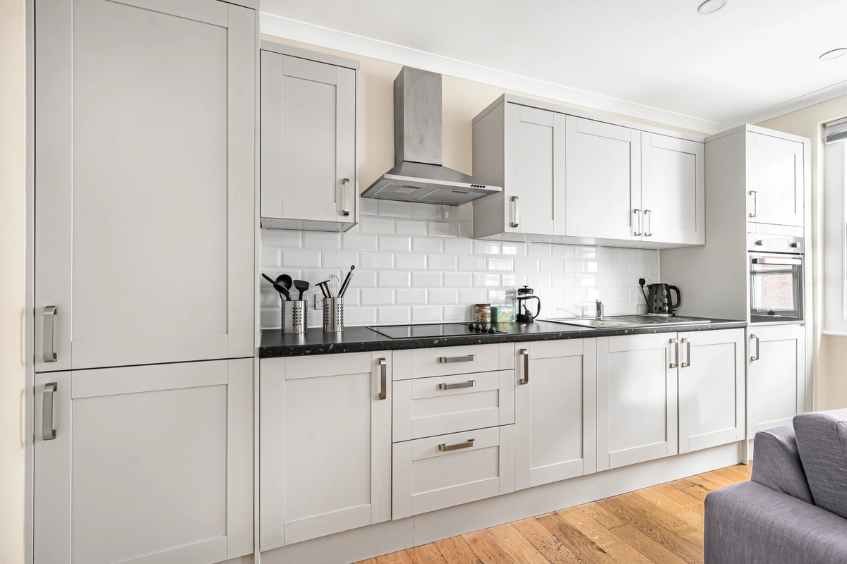 Stylish kitchen with sleek countertops and top-tier appliances