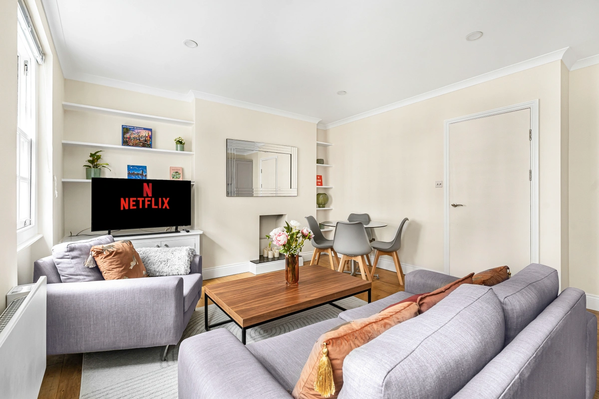 Open living space featuring a sofa, coffee table, and tasteful decor