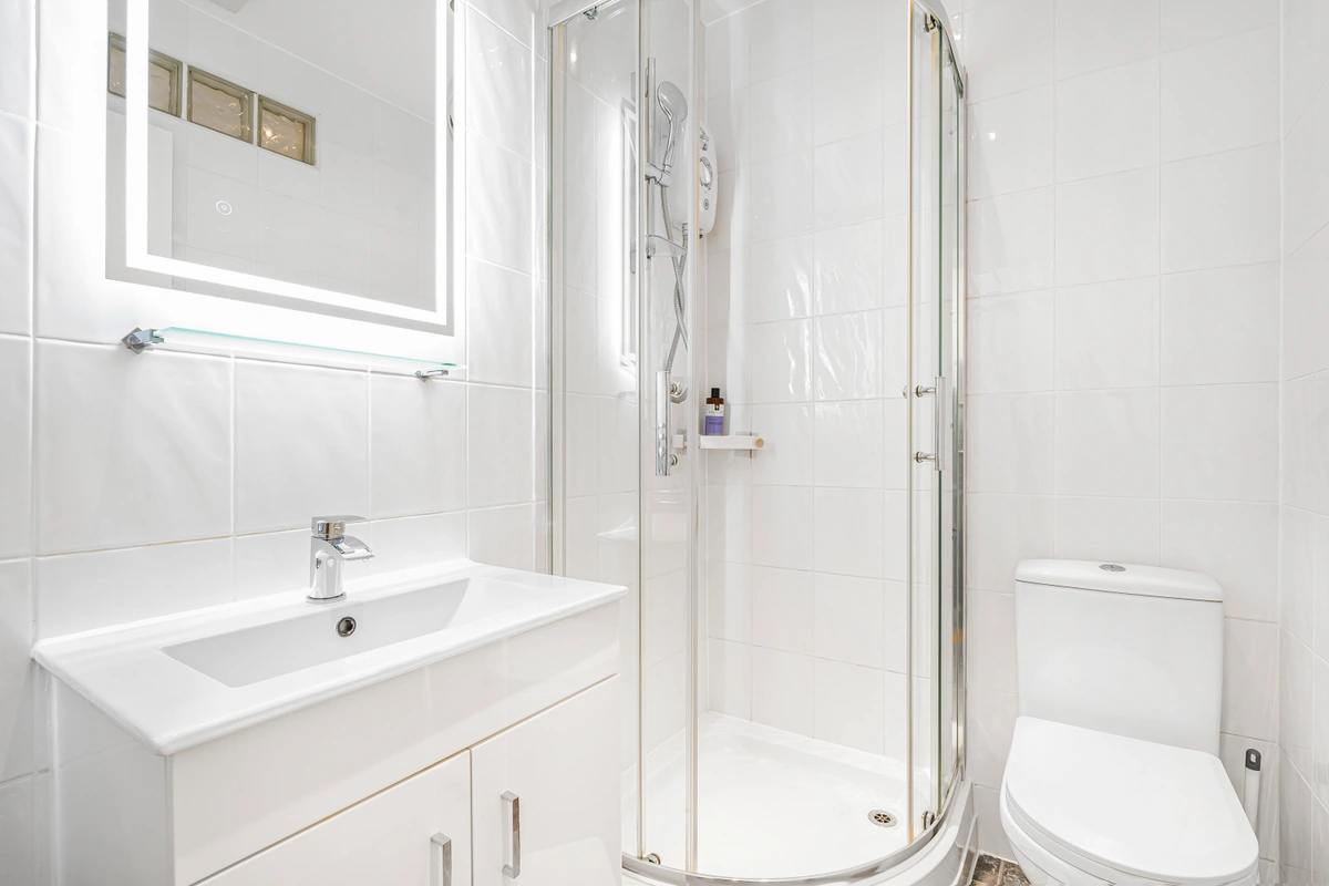 Sleek bathroom with modern fixtures and elegant tiles