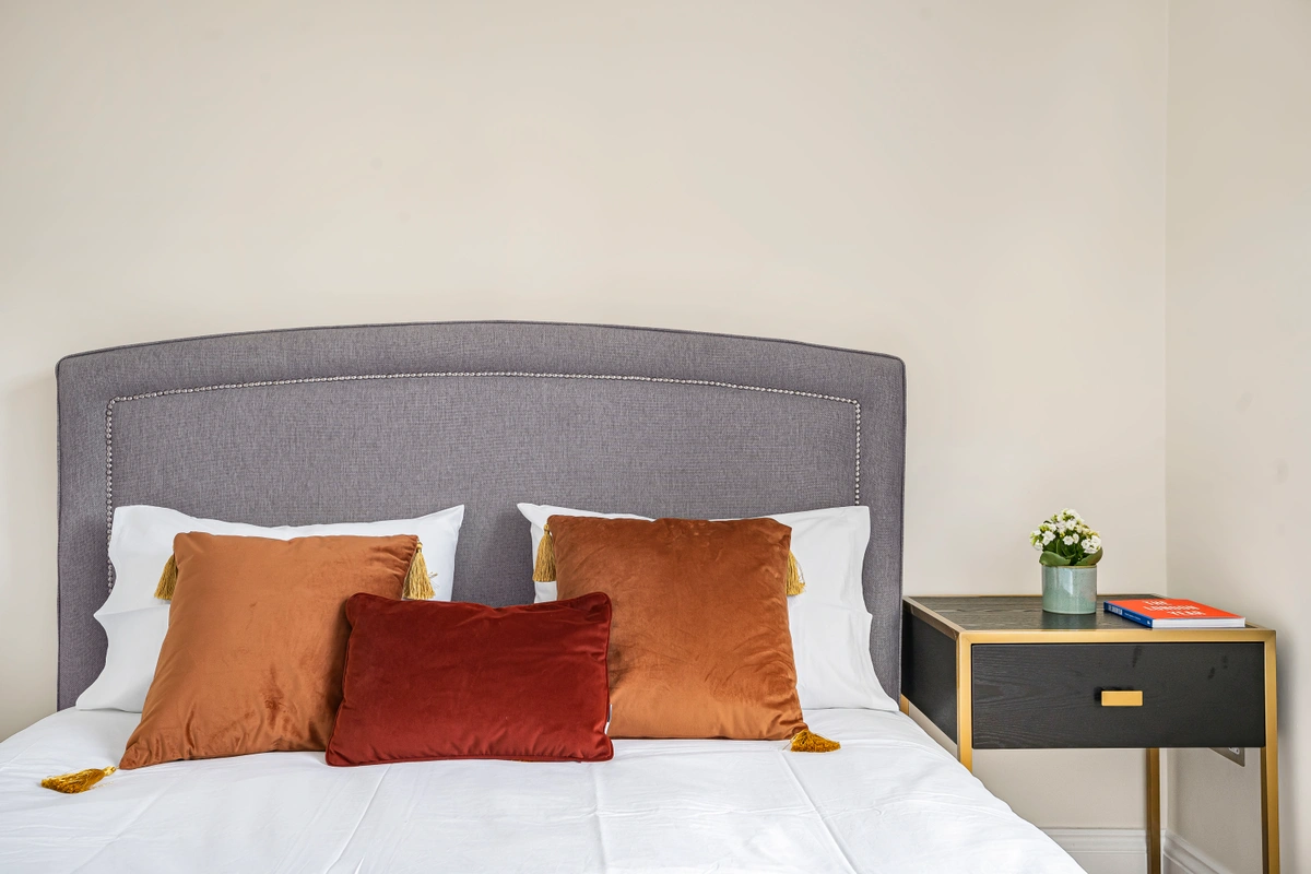 Peaceful bedroom with soft lighting and cozy atmosphere