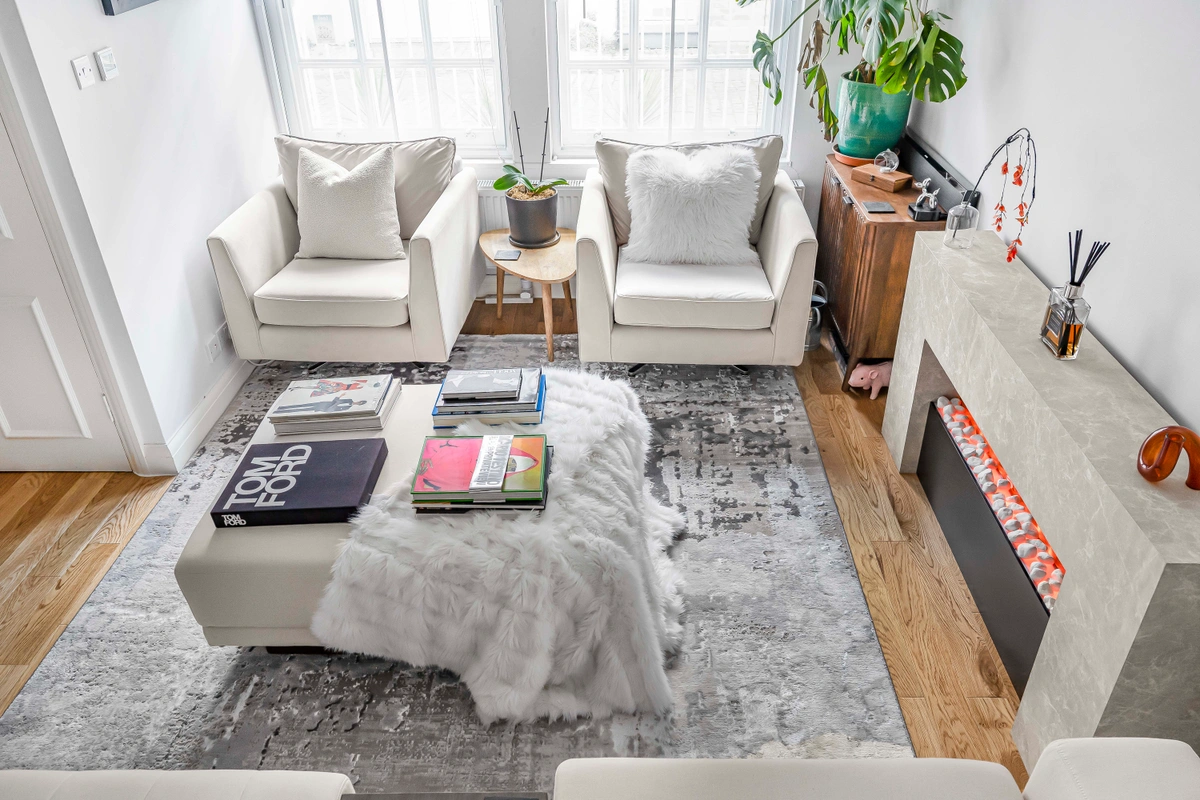Wide-angle view of the spacious living area with open-plan design
