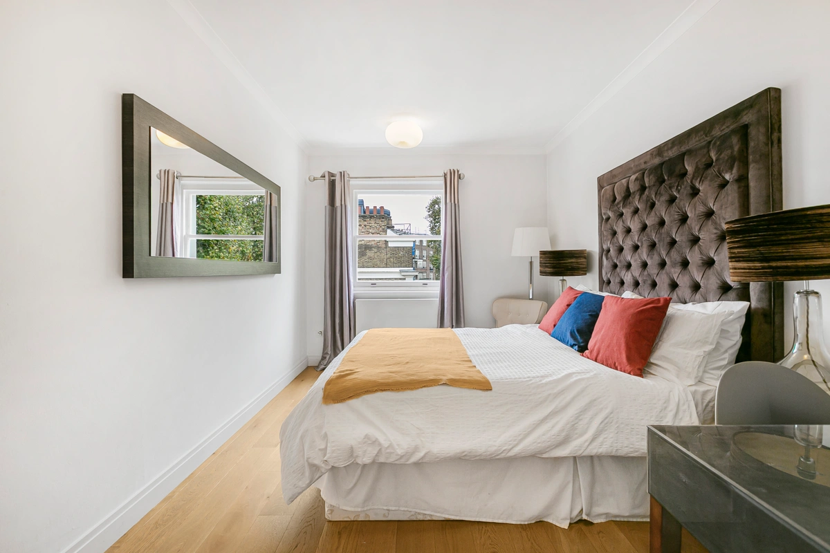 Guest bedroom with double bed and calming tone