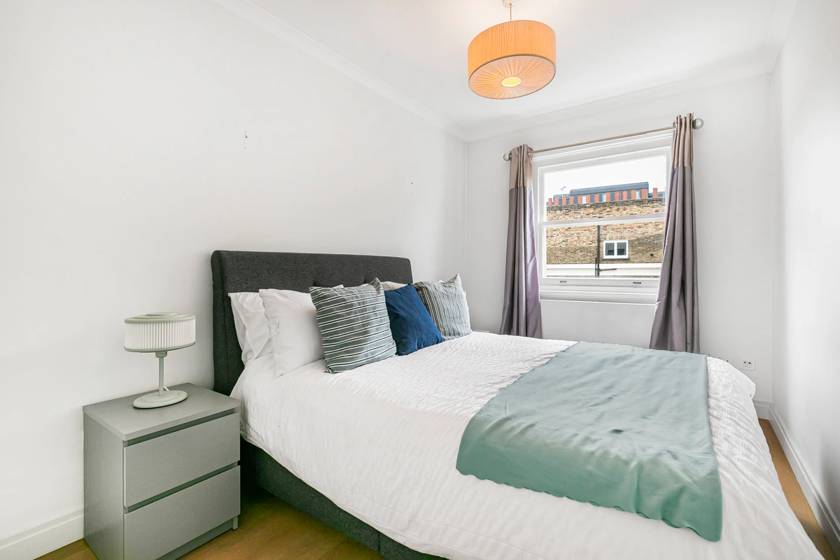 Luxurious bedroom with king-sized bed and soft neutral palette
