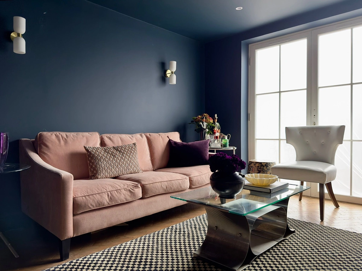 Contemporary lounge with plush seating and large windows