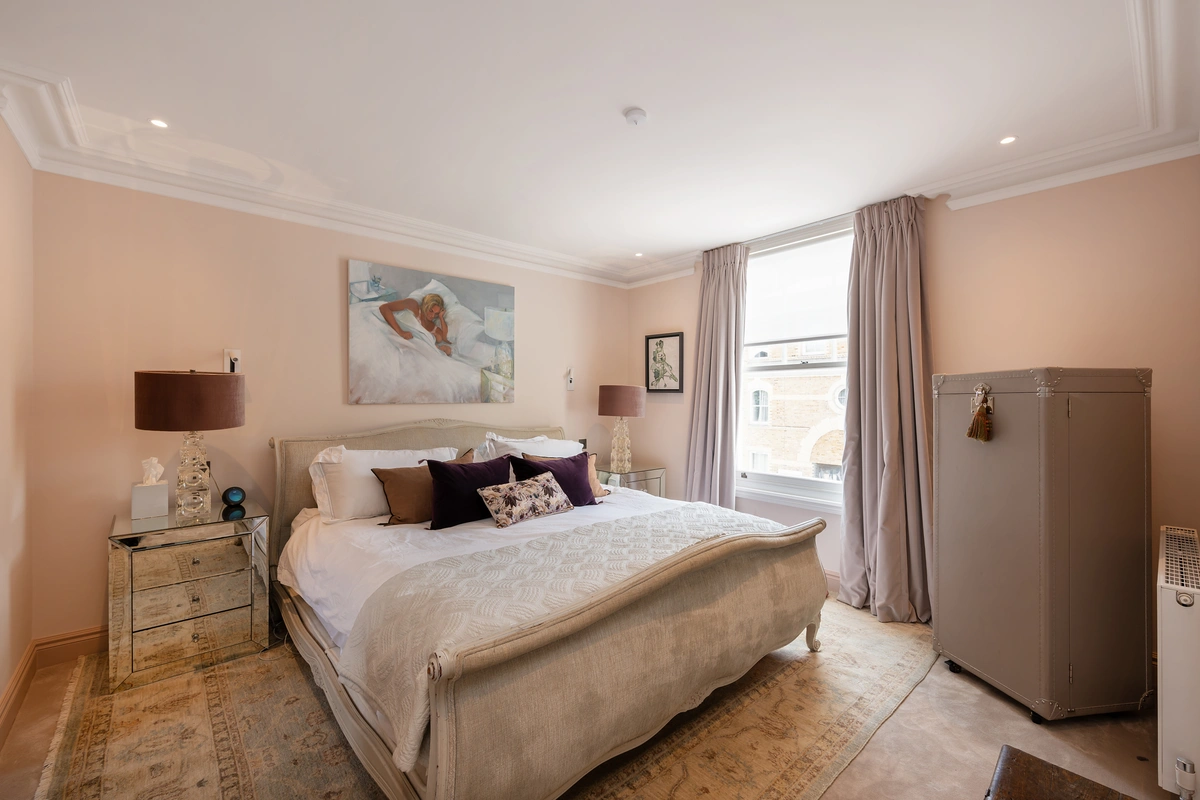Comfortable bedroom with cozy bedding and tasteful design