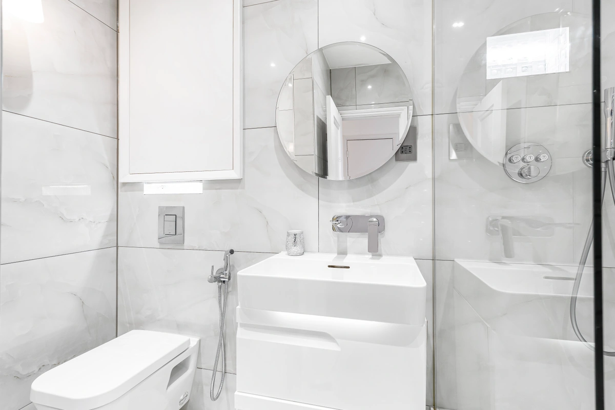 Marble bathroom with modern fixtures and luxury finishes