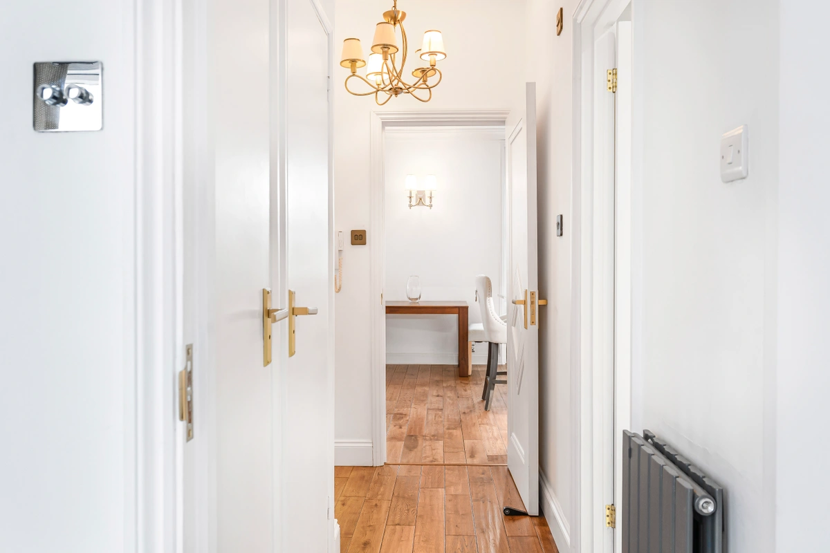 Well-lit corridor with modern flooring and clean design