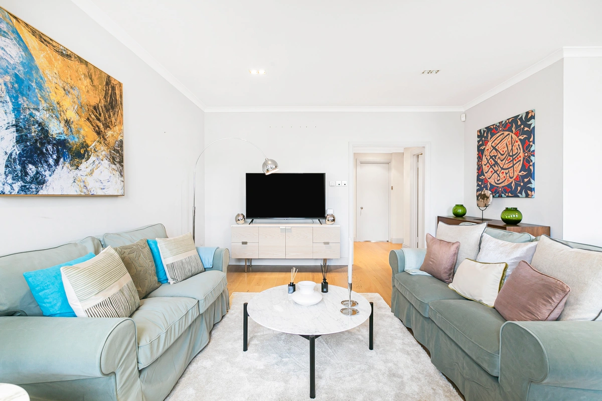 Living area with designer furniture and Hyde Park views