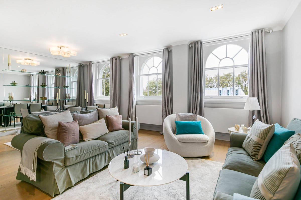 Second angle of the spacious living area at Casa Cribs perfect for relaxing or entertaining.