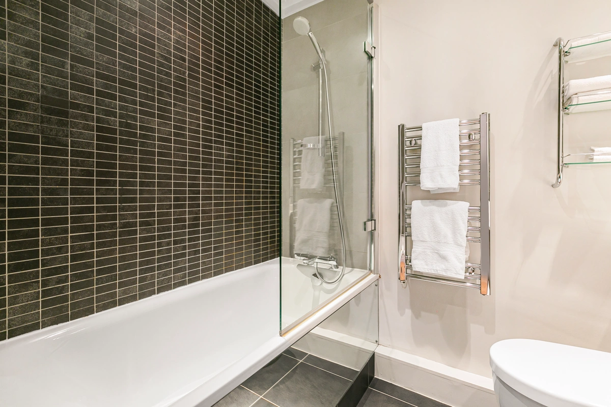 Modern bathroom with walk-in shower and elegant fixtures