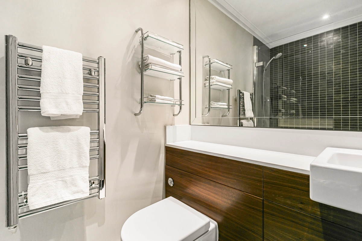 Spacious bathroom with marble accents and luxury amenities