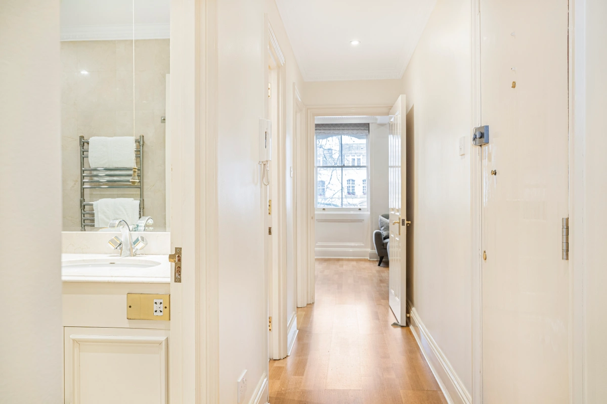 Elegant corridor connecting the apartment’s living spaces