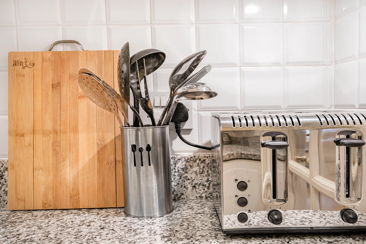 Zoomed-in view of luxury kitchen equipment including built-in appliances