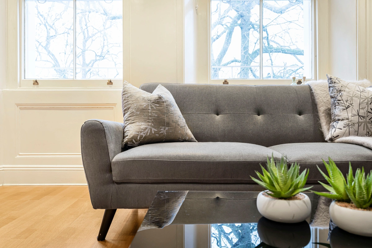 Spacious lounge with designer furniture and warm lighting
