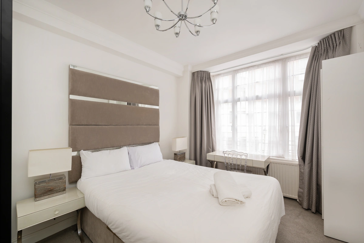 Second guest bedroom with stylish decor and calming colors