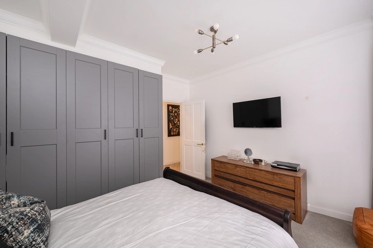 Second guest bedroom with stylish decor and calming colors