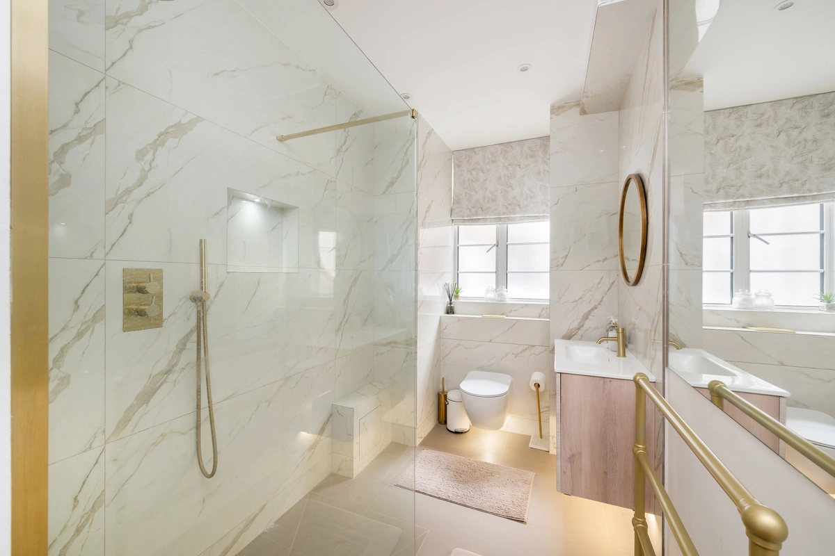 Luxurious bathroom with modern fixtures and walk-in shower