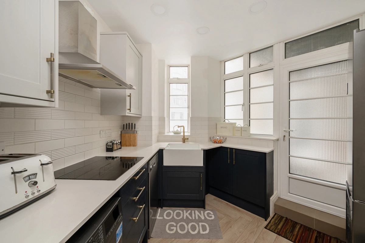 Sleek kitchen with integrated appliances and clean design