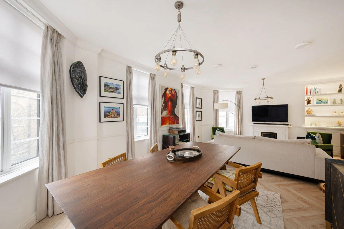 Elegant dining setup with natural light and sophisticated tones