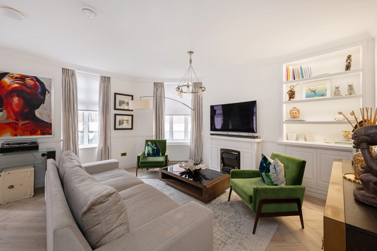 Modern living room with stylish furnishings and warm lighting