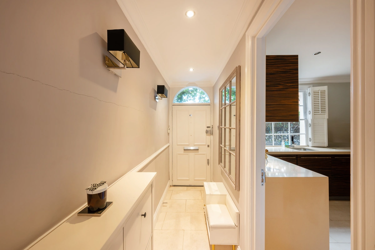 Elegant hallway with polished floors and modern decor