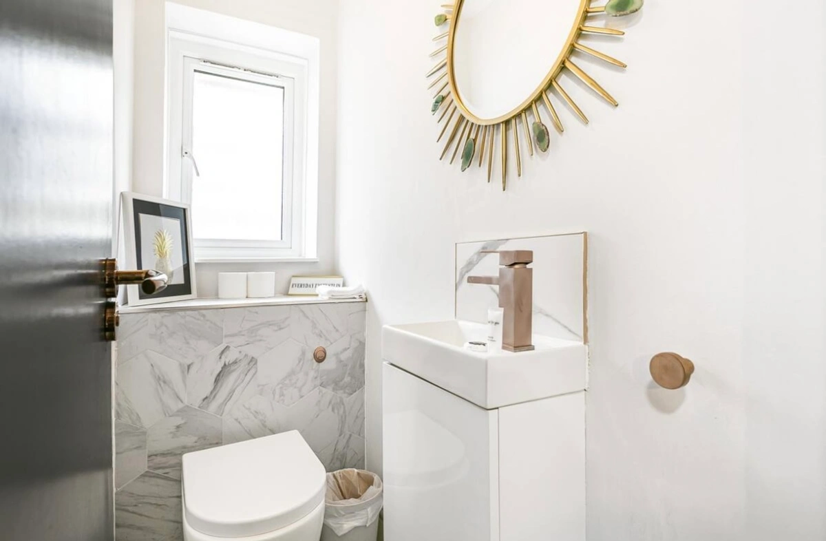 Contemporary bathroom with dual sinks and a spacious layout