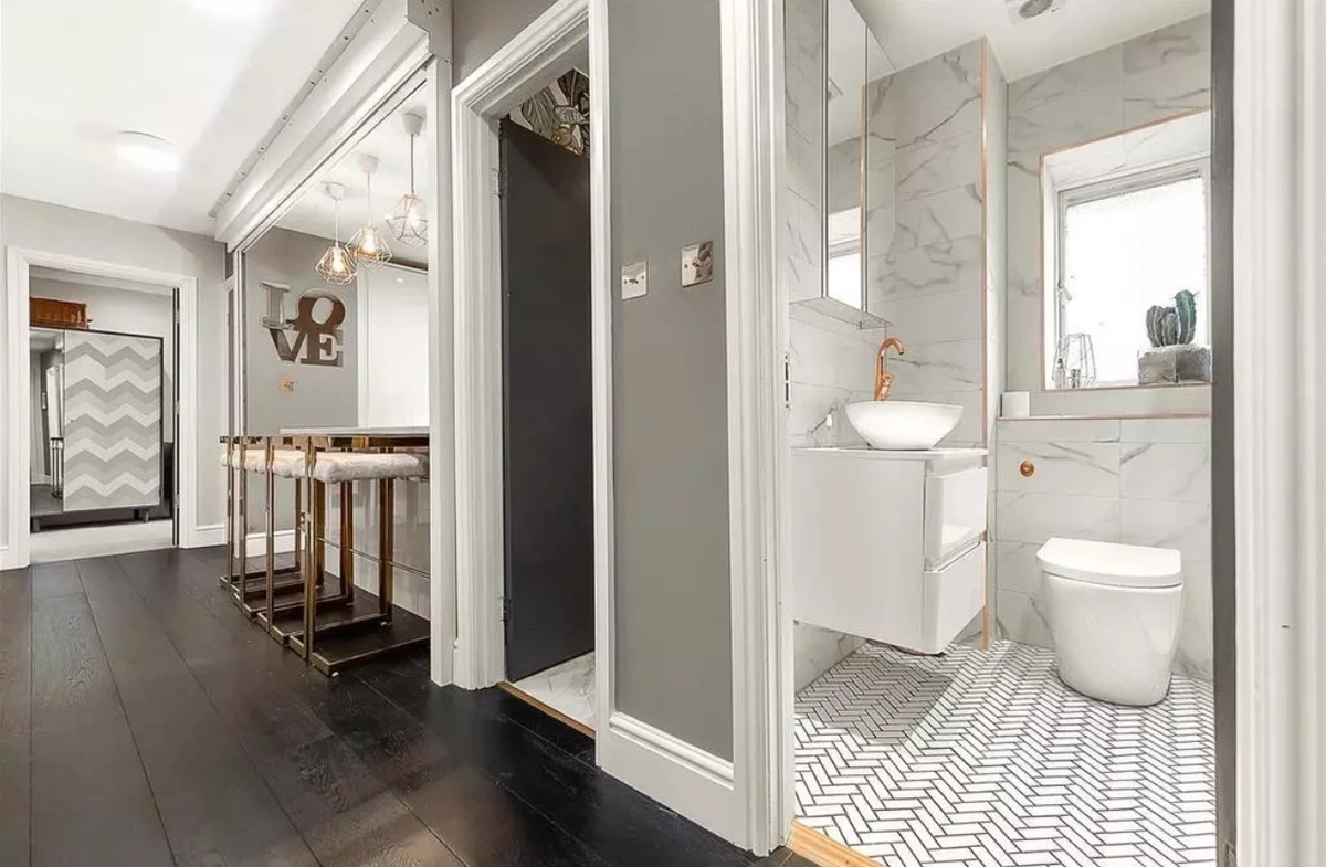Sleek bathroom with a walk-in shower and luxurious finishes