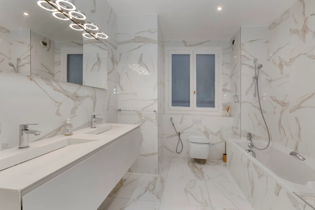 Another view of the marble-clad bathroom at Casa Cribs exuding timeless luxury and comfort.