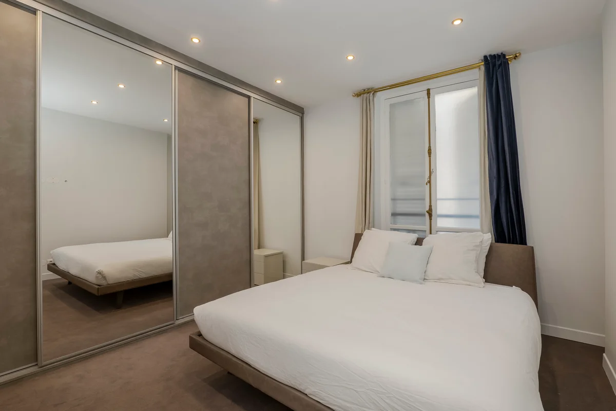 Another view of the refined bedroom at Casa Cribs blending comfort and Parisian elegance.