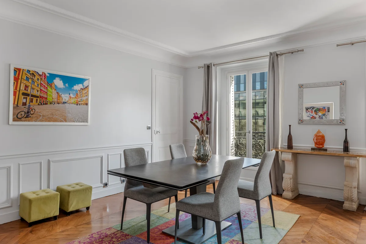 Dining table with chic chairs at Casa Cribs, blending style and practicality.