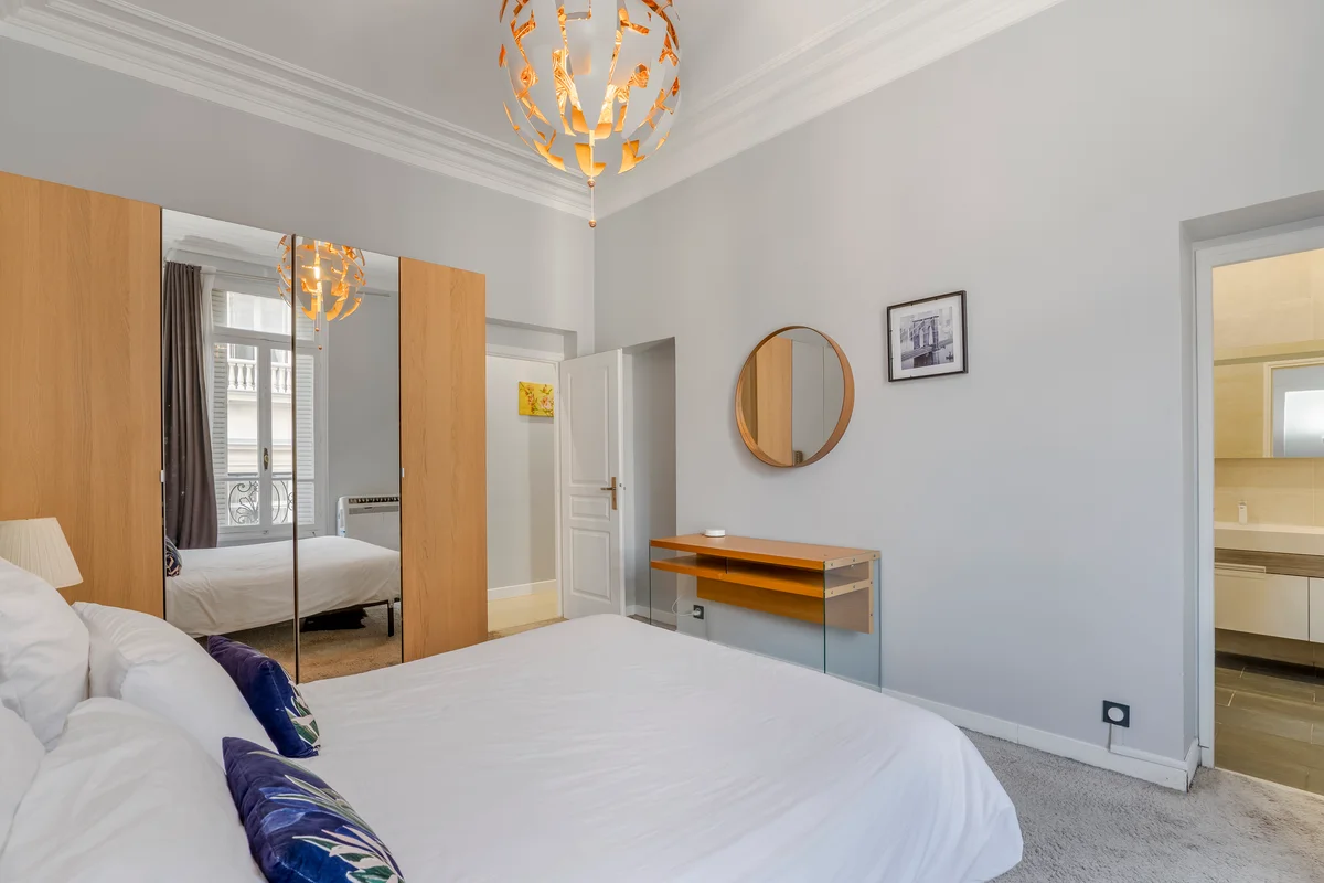 	Another cozy bedroom at Casa Cribs with refined linens and elegant design.