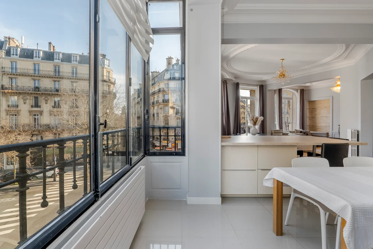 	Private balcony at Casa Cribs with classic Parisian charm and stunning views.