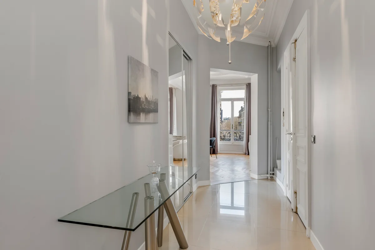 	Hallway at Casa Cribs with classic Haussmannian touches and refined finishes.