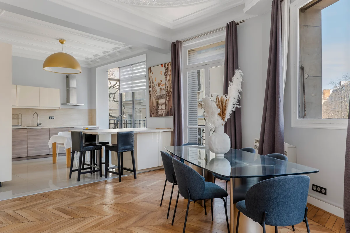 Elegant dining table at Casa Cribs set for refined meals in a light-filled setting.