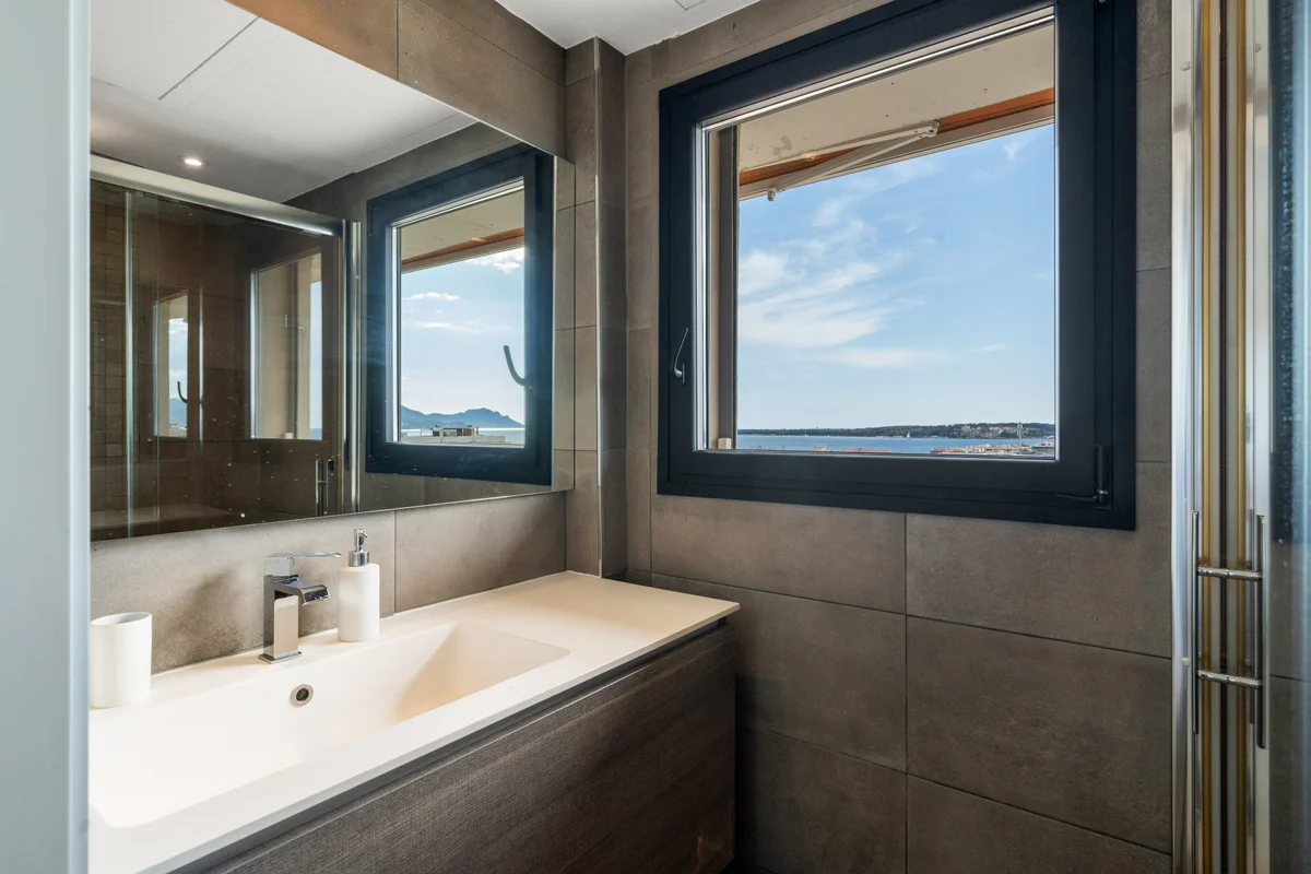 	Spa-inspired bathroom at Casa Cribs with sleek modern design and premium amenities.
