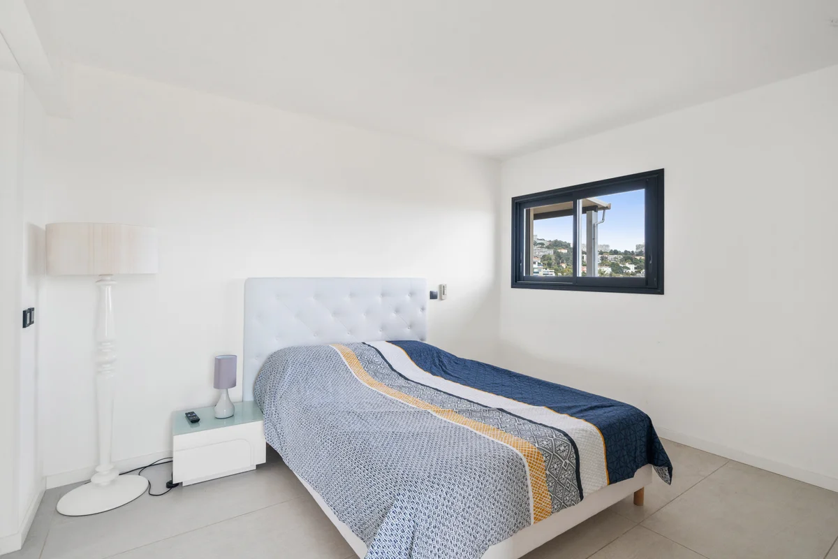 	Elegant bedroom at Casa Cribs featuring a plush king-sized bed and luxurious finishes.