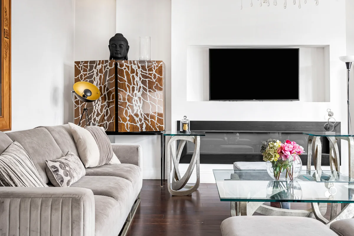 Plush sofa at Casa Cribs living area offering comfort and style.