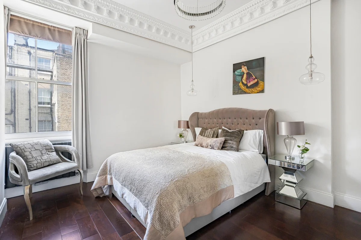 	Another view of the serene bedroom at Casa Cribs with ample natural light.