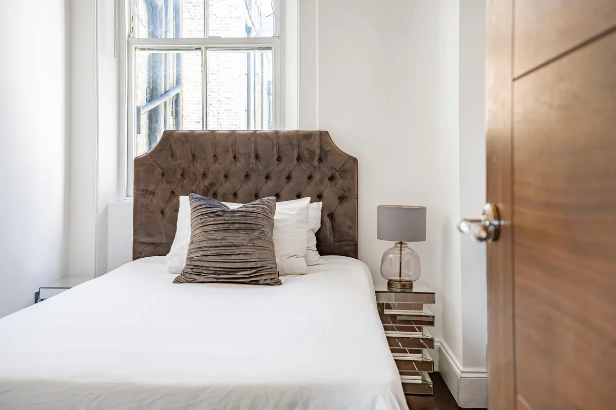 	Third angle of the bedroom at Casa Cribs showcasing refined furnishings and cozy atmosphere.