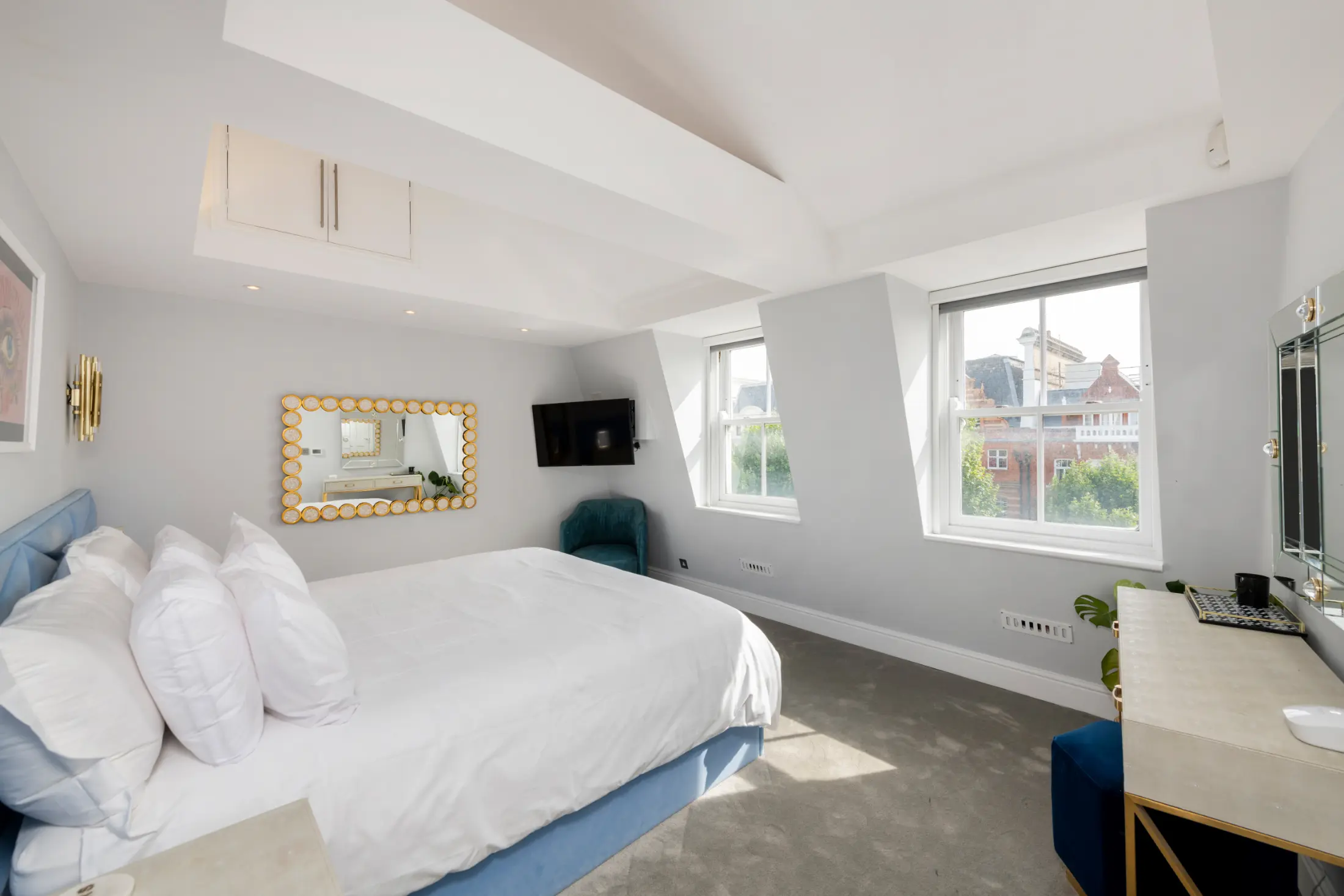Fourth angle of the elegant bedroom at Casa Cribs with refined bedding and decor.