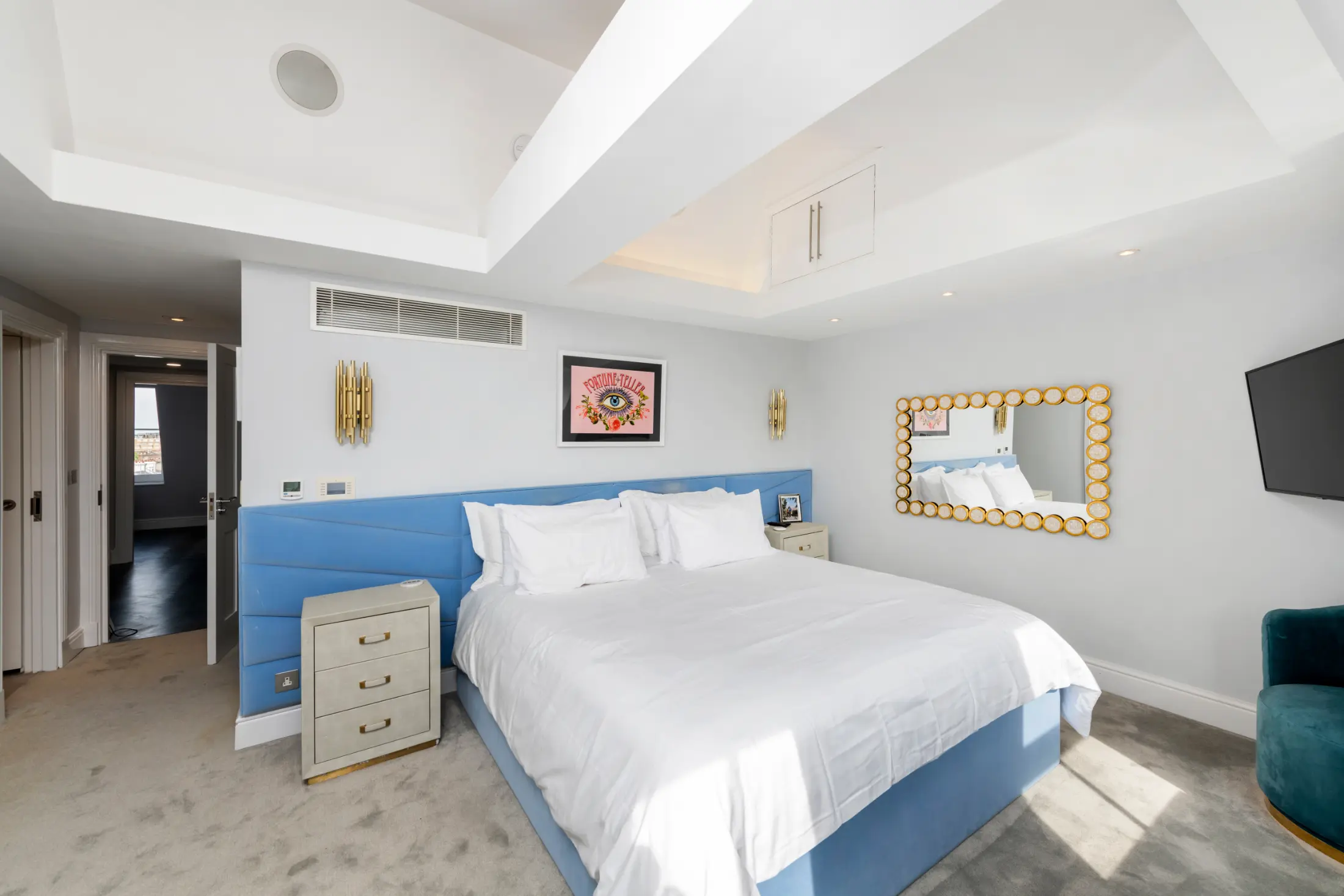 Third bedroom at Casa Cribs with cozy bedding and elegant finishes.