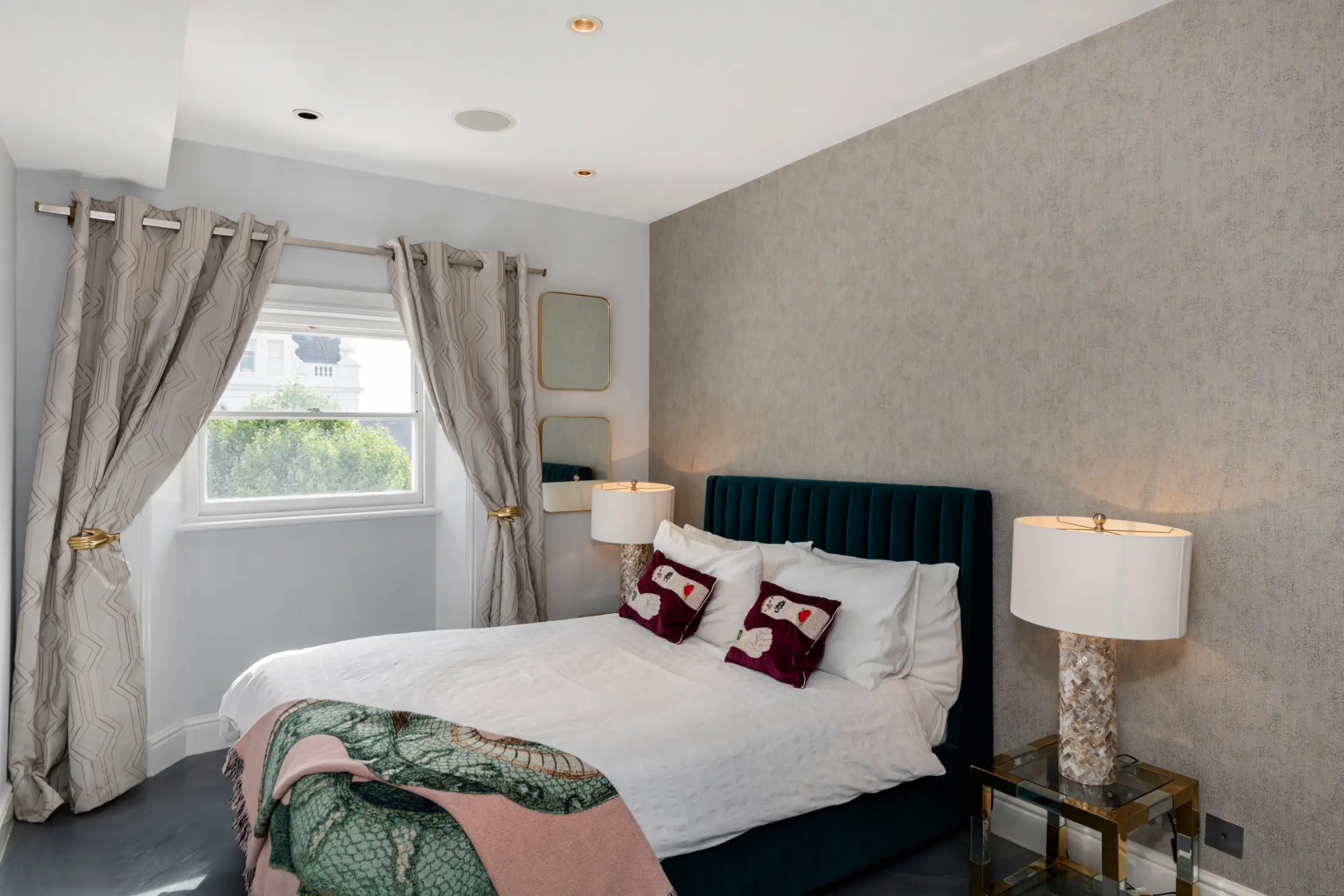 Another view of the elegant bedroom at Casa Cribs with serene decor and natural light.