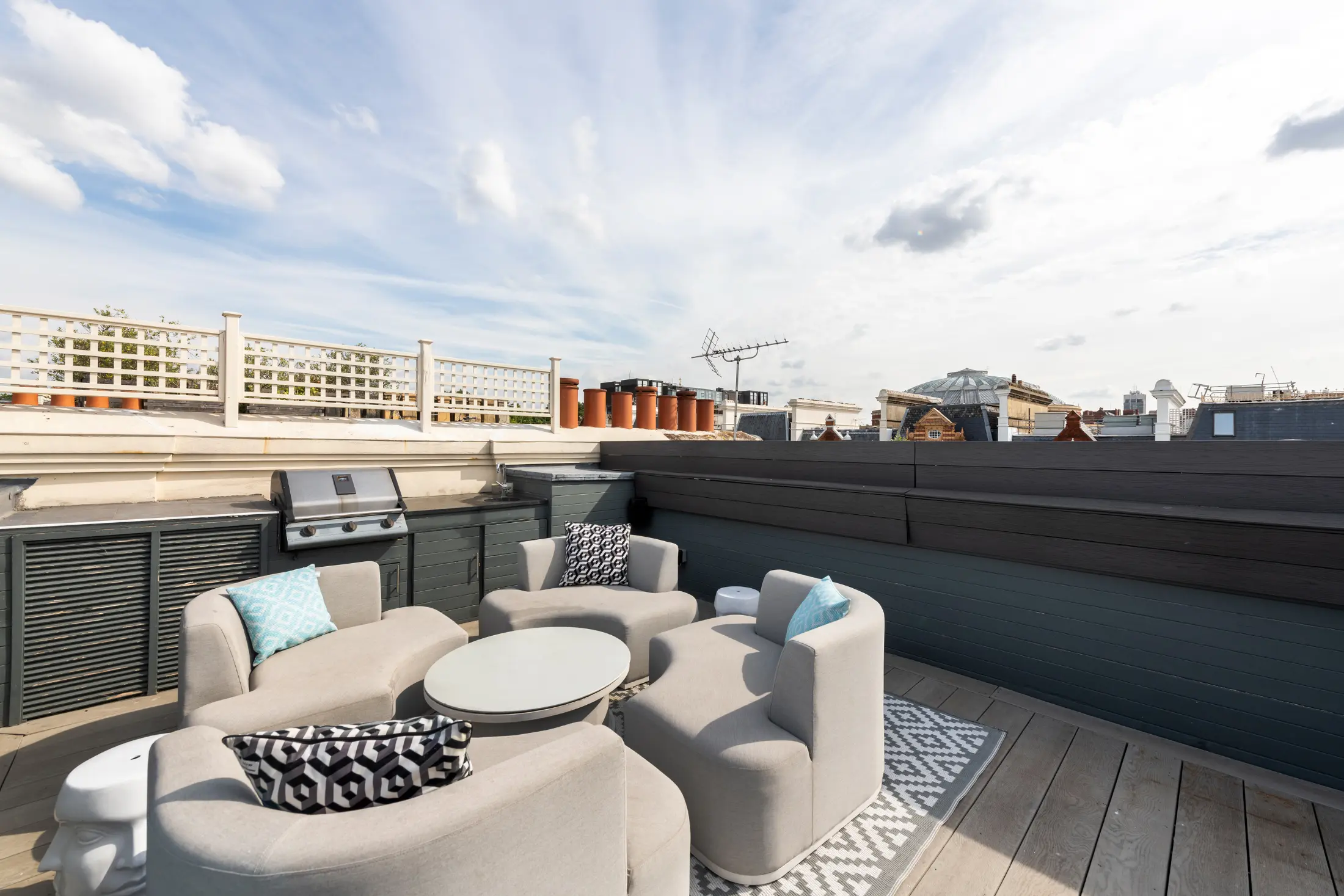 Balcony at Casa Cribs featuring chic outdoor seating and beautiful views.