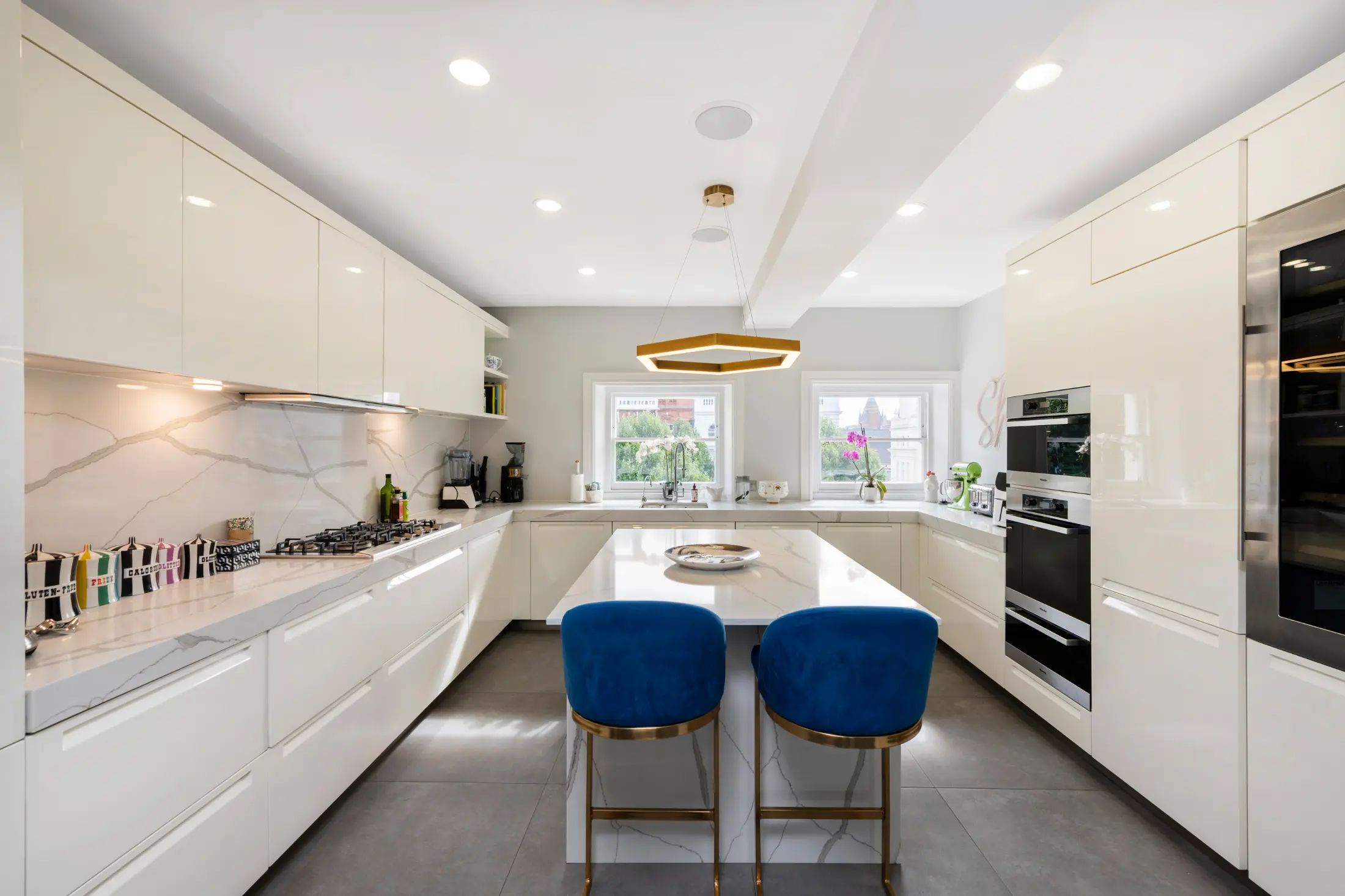 Third view of the open kitchen and dining area at Casa Cribs blending comfort and elegance.