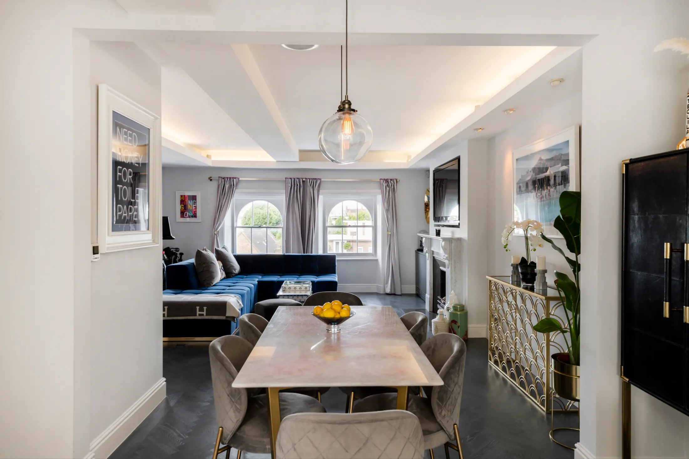 Another angle of the modern kitchen and dining space at Casa Cribs designed for gatherings.